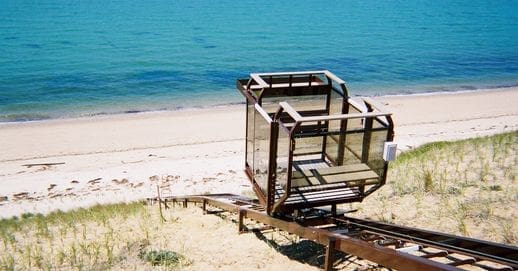 Hill Hiker sloped tram system to sandy ocean beach in cape cod